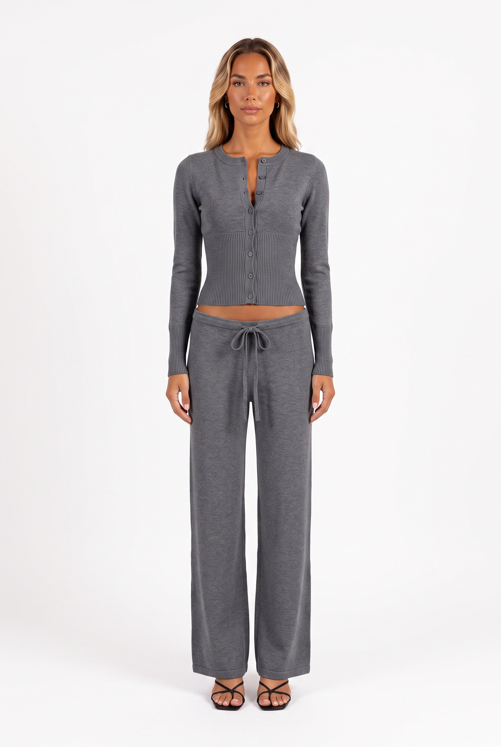 Dark grey knit cardigan and low-rise drawstring trouser set — front